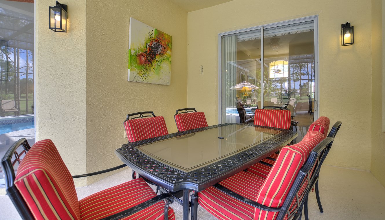 Covered lanai with patio table & 6 chairs - Hot Plate BBQ available for alfresco dining