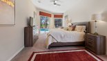 Villa rentals in Orlando, check out the Master bedroom #1 with king sized bed, Roku enabled LCD TV & views over pool deck