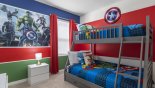 Bedroom #5 with Avengers theming featuring a bunk bed (twin over full-size) - www.iwantavilla.com is your first choice of Villa rentals in Orlando direct with owner