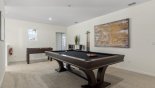Spacious rental Solterra Resort Villa in Orlando complete with stunning Entertainment loft with pool table & table foosball