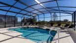 Pool with open views and no rear neighbors - frosted lower panels provides additional privacy - www.iwantavilla.com is the best in Orlando vacation Villa rentals