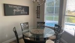 Villa rentals near Disney direct with owner, check out the Dining area with 3 way views onto pool deck and seating for 6