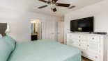 Villa rentals near Disney direct with owner, check out the Master bedroom #2 with large smart TV