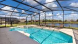 Large pool deck with stunning open pond views with this Orlando Villa for rent direct from owner