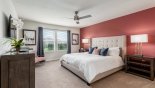 Orlando Townhouse for rent direct from owner, check out the Master bedroom #1 with king sized bed & wall-mounted LCD cable TV