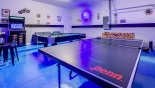 Spacious rental Watersong Resort Villa in Orlando complete with stunning Games room with pool table, table tennis, table foosball & arcade machine