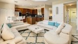 Spacious rental Watersong Resort Villa in Orlando complete with stunning Family room viewed towards kitchen