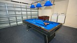 Villa rentals in Orlando, check out the Games room incorporating laundry facility inset in wall