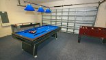 Games room with pool table, air hockey & table foosball with this Orlando Villa for rent direct from owner