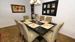 Dining area with large dining table & 6 comfortable chairs - www.iwantavilla.com is the best in Orlando vacation Villa rentals