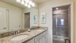 Master #1 ensuite bathroom with large walk-in shower, his & hers sinks & WC - www.iwantavilla.com is the best in Orlando vacation Townhouse rentals