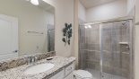 Family bathroom #4 with walk-in shower, single vanity & WC - adjacent to bedroom #5 from Castaway 2 Townhouse for rent in Orlando