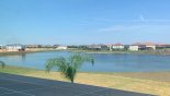 Townhouse rentals near Disney direct with owner, check out the View of lake over pool deck from master bedroom #1