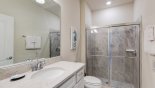 Family bathroom #4 with walk-in shower, single vanity & WC - adjacent to bedroom #5 from Castaway 4 Townhouse for rent in Orlando