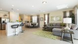 View of kitchen, family room and dining area - www.iwantavilla.com is the best in Orlando vacation Villa rentals