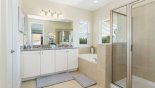 Master #1 ensuite bathroom with large walk-in shower, Roman bath, his & hers sinks & separate WC from Crestview 3 Villa for rent in Orlando