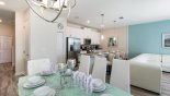 Orlando Townhouse for rent direct from owner, check out the Dining area with frosted glass topped dining table & 8 chairs