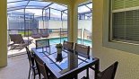 Covered lanai with patio table & 6 chairs - www.iwantavilla.com is your first choice of Townhouse rentals in Orlando direct with owner