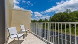 Private balcony with 2 chairs to relax and enjoy the views with this Orlando Townhouse for rent direct from owner