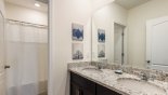 Villa rentals near Disney direct with owner, check out the Family bathroom #5 with bath & shower over & WC and separate his & hers sinks in adjacent room