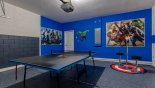 Villa rentals in Orlando, check out the Games room with table tennis table and Marvel theming