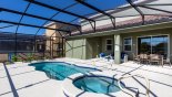 Villa rentals near Disney direct with owner, check out the Covered lanai with patio table & 6 chairs plus soft seating area with sofa & 2 armchairs