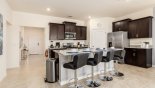 Villa rentals near Disney direct with owner, check out the Kitchen breakfast bar with 4 bar stools
