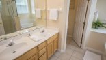 Master #1 ensuite bathroom with Roman bath, his & hers sinks, large walk-in shower & separate WC from Ashley 1 Villa for rent in Orlando