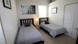 Villa rentals near Disney direct with owner, check out the Bedroom #3 with twin beds & LCD cable TV (out of view)