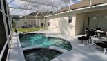 Pool deck with 2 sun loungers plus additional 2 reclining chairs with footstools from Limewood 1 Villa for rent in Orlando