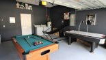 Villa rentals in Orlando, check out the Games room with pool table, air hockey & basket ball game - laundry facilities also located here