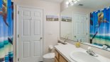 Villa rentals in Orlando, check out the Jack & Jill family bathroom #2 with bath & shower over, single vanity & WC