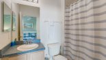 Master ensuite bathroom #2 with bath & shower over, single vanity & WC from Highlands Reserve rental Villa direct from owner
