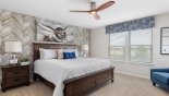Spacious rental Solterra Resort Villa in Orlando complete with stunning Master suite #1 with king sized bed and views over pool deck