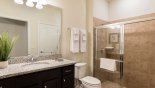 Jack & Jill bathroom #3 with walk-in shower, single sink and WC with this Orlando Villa for rent direct from owner