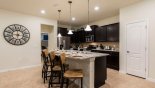 Villa rentals in Orlando, check out the Fully fitted kitchen with quality appliances and granite counter tops - breakfast bar with 4 seats