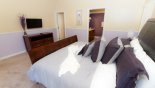 Madison 1 Villa rental near Disney with Master bedroom with king sized bed and wall-mounted LCD cable TV