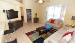 Family room with views and direct access onto pool deck from Highlands Reserve rental Villa direct from owner