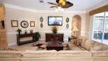 Santa Barbara 1 Villa rental near Disney with Family room with ample seating to watch a movie on the wall-mounted 55