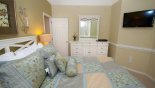 Villa rentals in Orlando, check out the Bedroom #5 with wall mounted LCD cable TV
