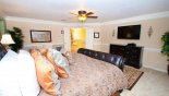 Villa rentals in Orlando, check out the Master bedroom #1 with wall-mounted LCD cable TV & DVD