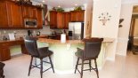 Villa rentals in Orlando, check out the Kitchen breakfast bar with 2 bar stools