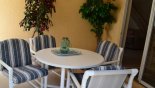 Shady covered lanai with patio table & 4 chairs from Belmonte + 1 Villa for rent in Orlando