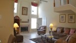 Villa rentals near Disney direct with owner, check out the Great room with cathedral ceiling providing ample seating to watch the LCD cable TV