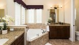 Villa rentals in Orlando, check out the Master #1 ensuite with corner bath, walk-in shower, his 'n' her sinks & separate WC