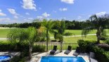 Villa rentals near Disney direct with owner, check out the View of pool from upstairs balcony off master #1 bedroom overlooking golf course