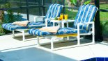 Pool deck with 2 sun loungers + 2 reclining chairs with footstools from Highlands Reserve rental Villa direct from owner