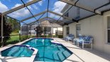 Pool deck with additional 4 chairs to relax in the sun with this Orlando Villa for rent direct from owner
