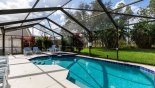 Sunny west-facing pool & spa with golf course views through pine trees from Belmonte + 2 Villa for rent in Orlando