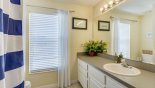 Family bathroom #2 with bath & shower over, single vanity & WC from Highlands Reserve rental Villa direct from owner
